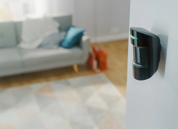 Sensor mounted on a living room wall