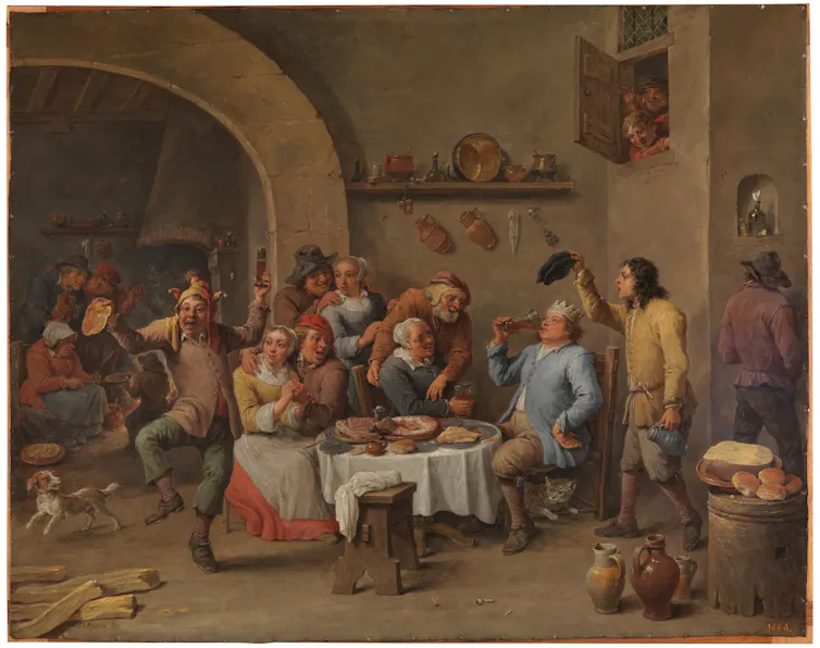 painting of people enjoying an animated feast.