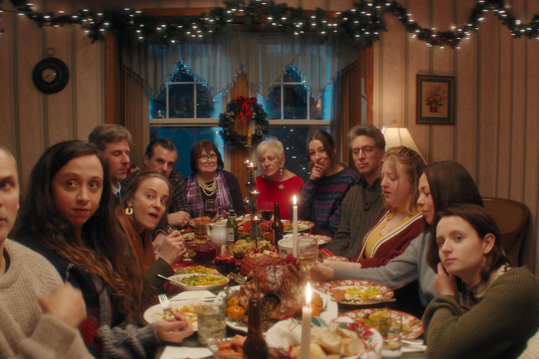 The ensemble cast of Christmas Eve in Miller's Point sit round a dinner table