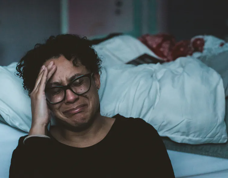 Woman cries
