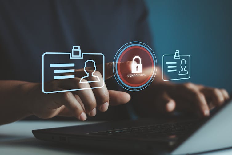 Icons suggesting digital privacy, a lock and two figures on digital index cards.