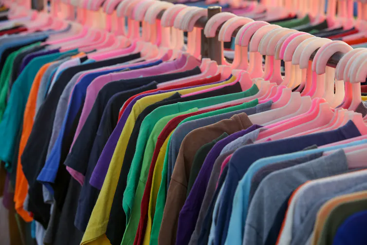 tshirts on charity shop rack