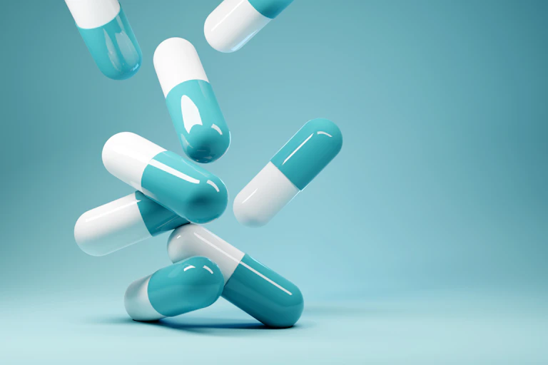 Blue and white capsules
