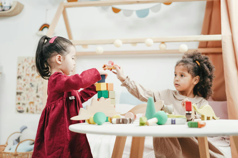 Two children play blocks