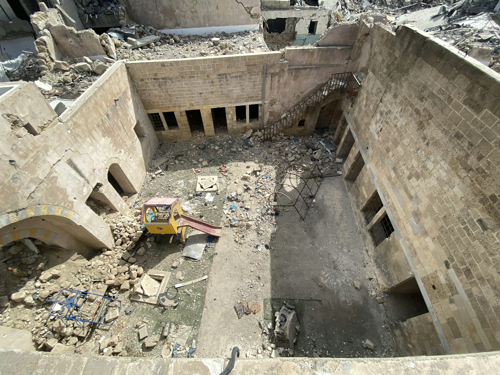 Damage across the central courtyard of Hathat Palace.