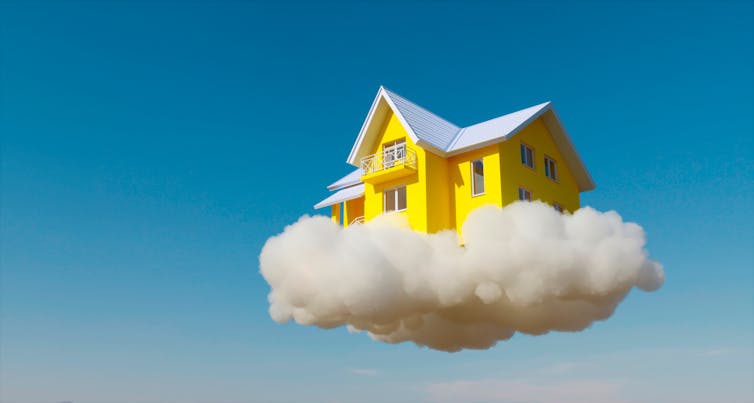 A house floating in clouds.