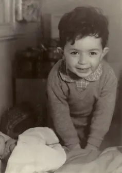 A smiling little boy.
