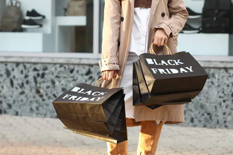 Woman carrying shopping bags