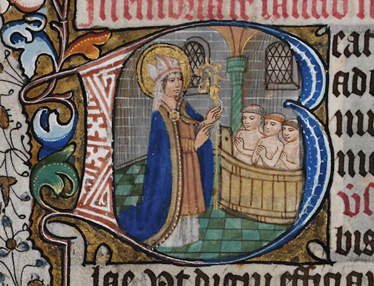 A saint stands above three children in a tub.
