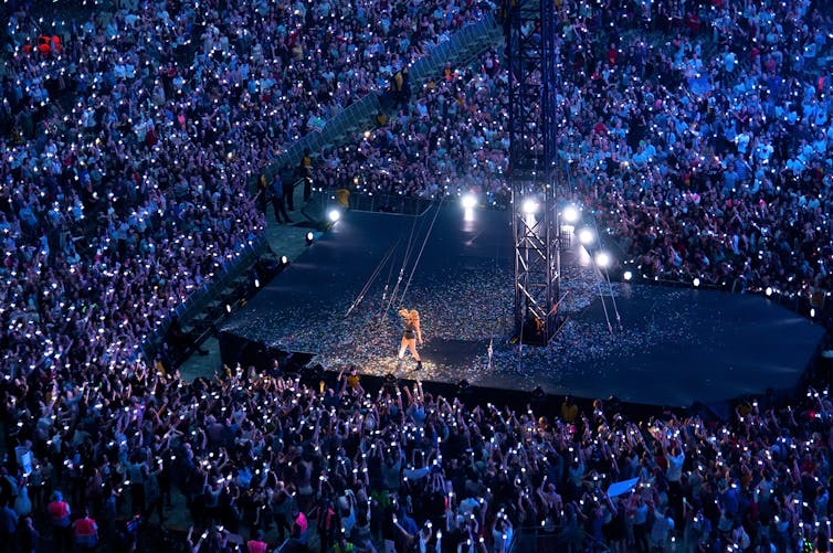 Taylor Swift performing to fans
