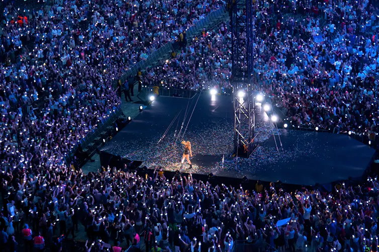 Taylor Swift performing to fans