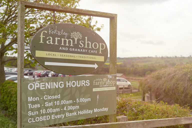 sign for a farm shop and cafe