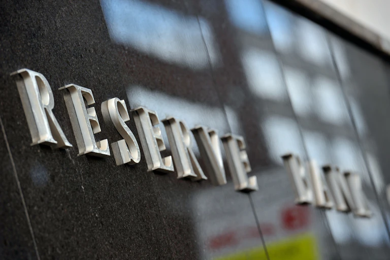 Reserve Bank letter signage on the side of the Reserve Bank of Australia building in Sydney