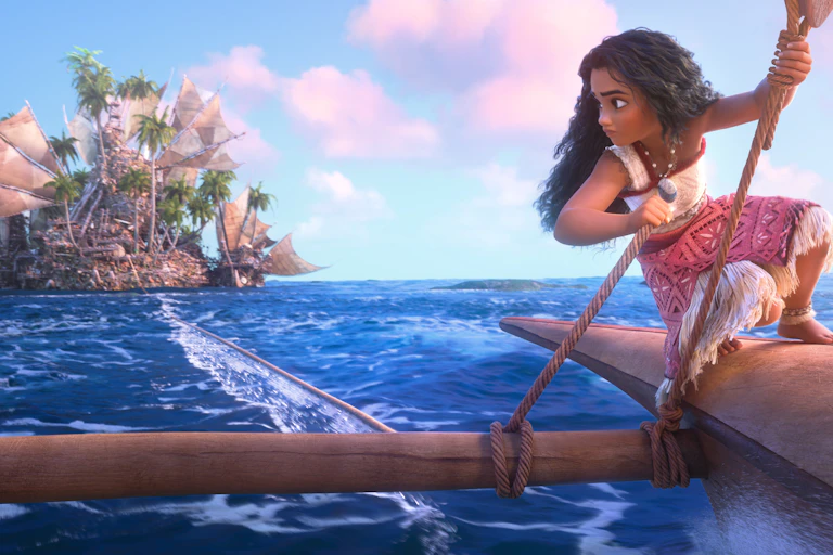 A still from Moana 2 showing a young island girl on a wooden boat.