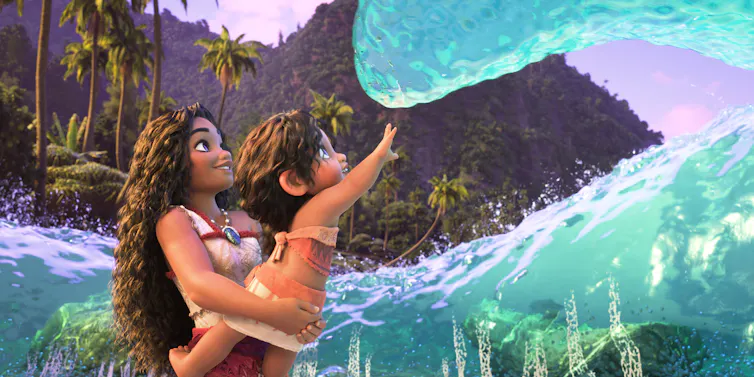 An animation still showing a young woman and a small girl reaching out towards a wave in the ocean.