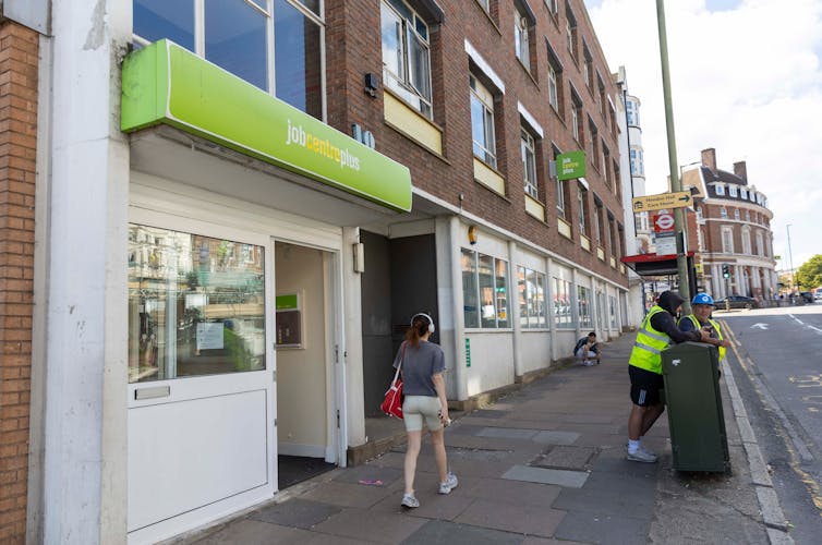 View of street with Jobcentre sign in green