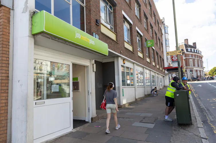 View of street with Jobcentre sign in green