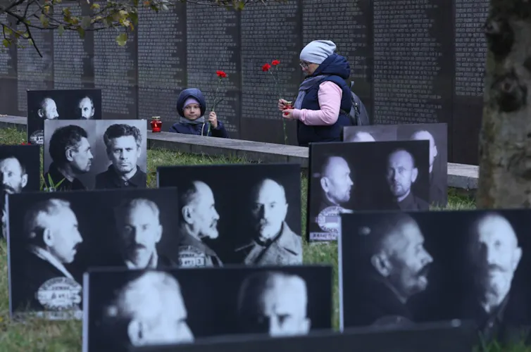Images of people who were executed during the Great Terror in Stalin's Soviet Union at a memorial in Moscow.