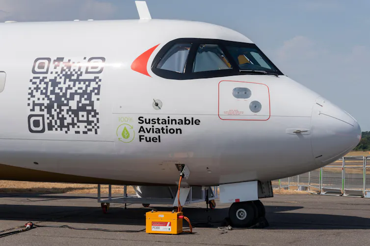 A white plane with the words