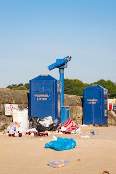 Litter piling up next to public bins.