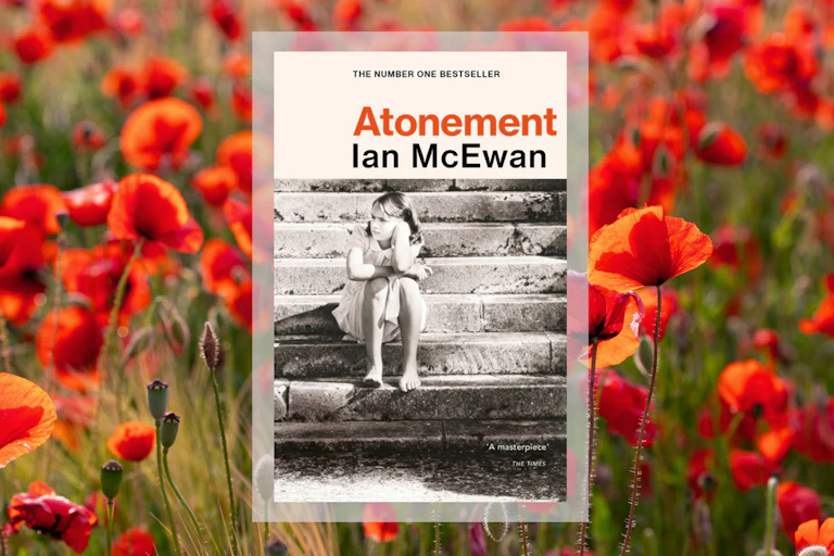 A copy of Atonement laid over a field of poppies