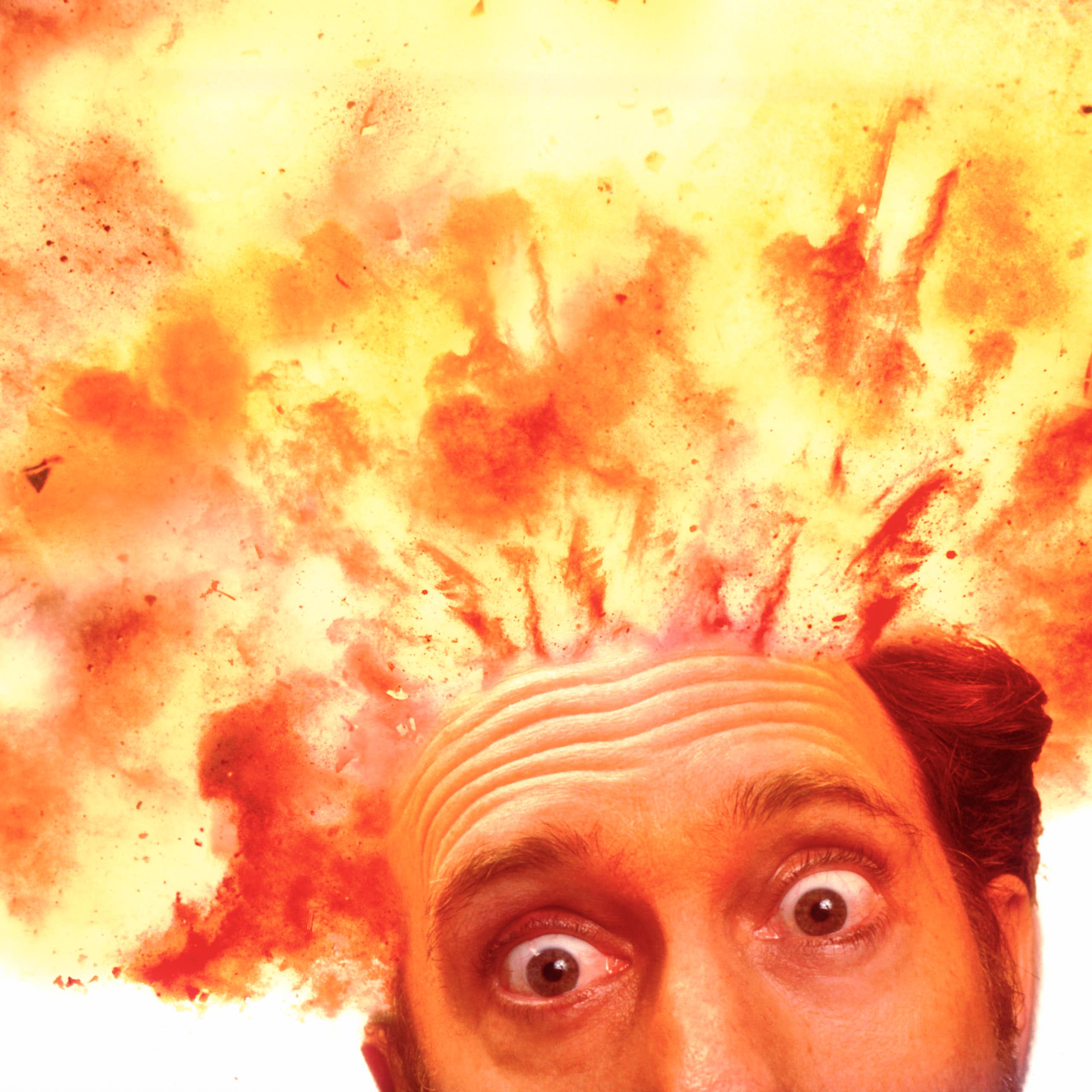 A man's head exploding at the top in flames.
