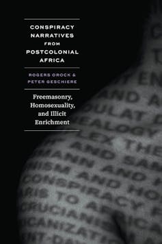 A book cover featuring a black and white image of part of a naked torso with words projected on to it.