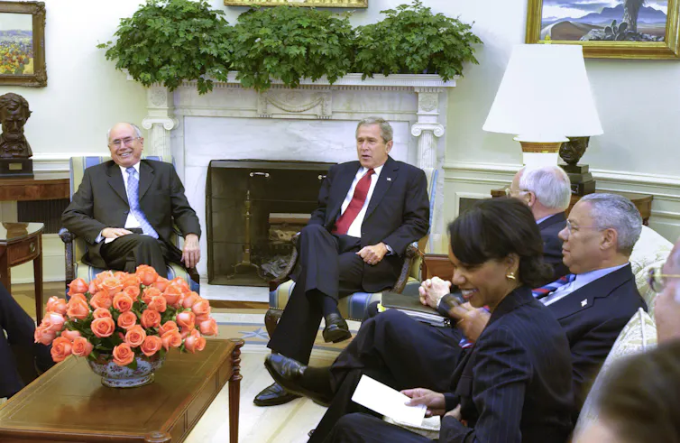 John Howard meets with Bush and other senior George W. Bush administration figures.