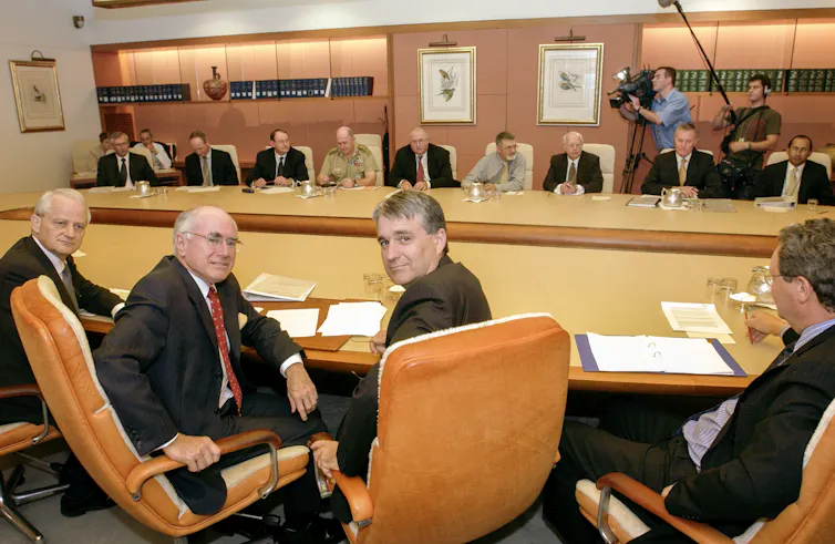 Attorney-General Phillip Ruddock (left), Prime Minister John Howard (second from centre) and Deputy Prime Minister John Anderson (centre) and other members of the National Security Committee (NSC), Australia’s peak defence and foreign policy decision-maki