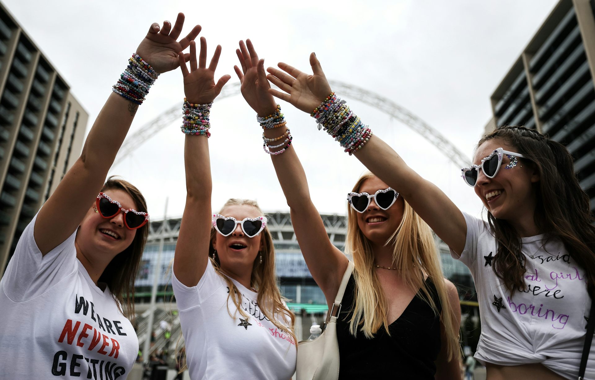 a group girls showing off bracelets