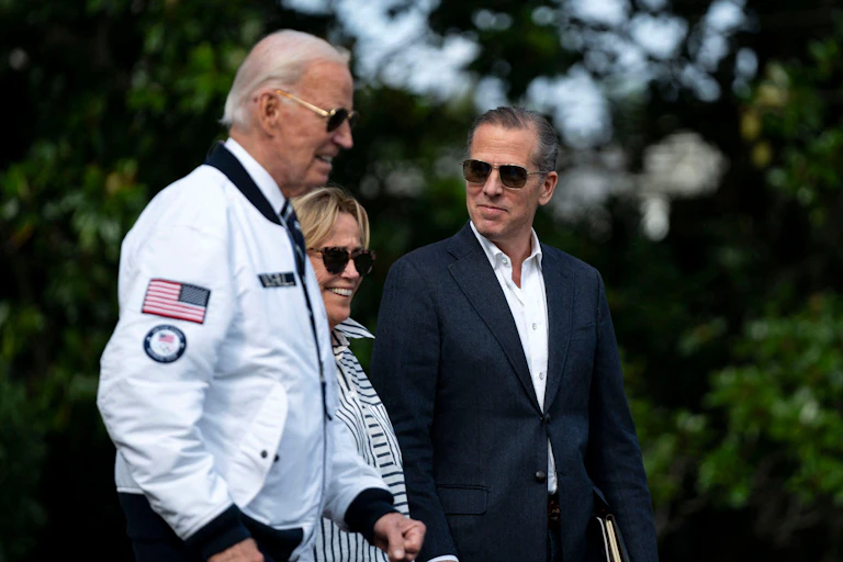 US president Joe Biden with his sister Valerie Biden Owens and his son Hunter Biden.