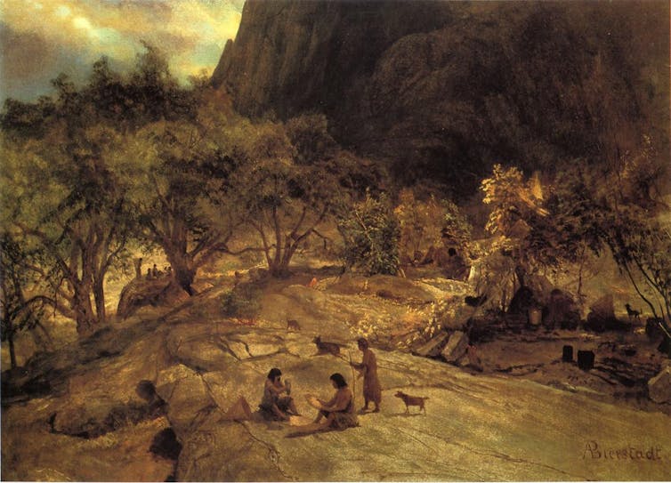 Painting of three Native Americans with several dogs on a rocky plateau.