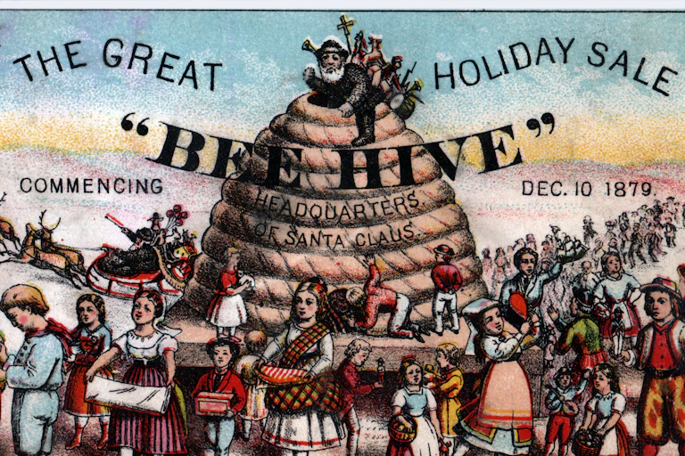 An old-fashioned ad with a beehive labeled 'HEADQUARTERS OF SANTA CLAUS' and many children with gifts below it and also a reindeer-drawn sled.