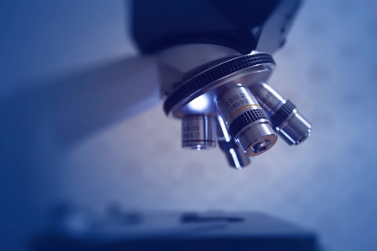 A close-up of a microscope