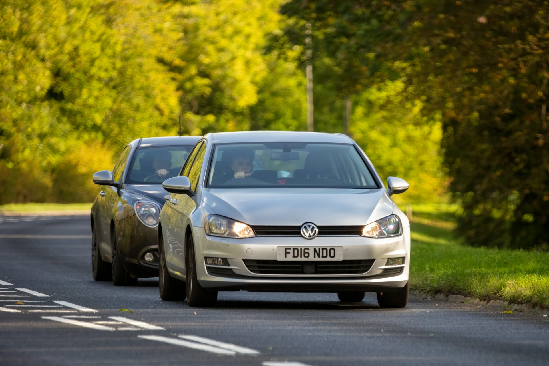 A driver follows too closely behind another driver.