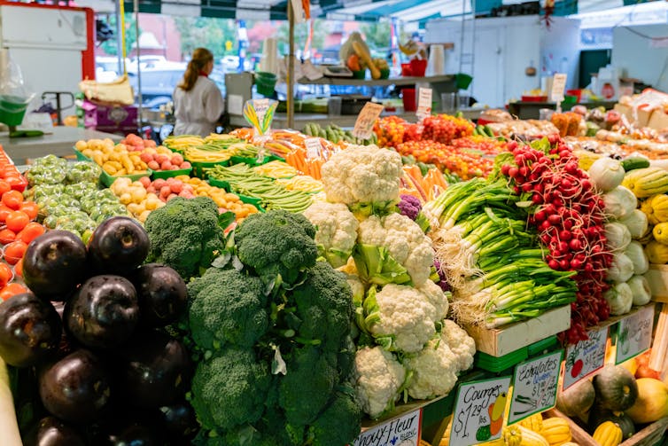 Fresh vegetables on display at a farmer's market