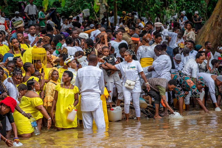 A group of people by a river