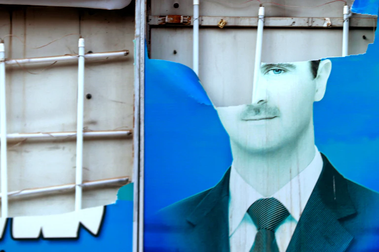 Atorn image of a man on a blue background.