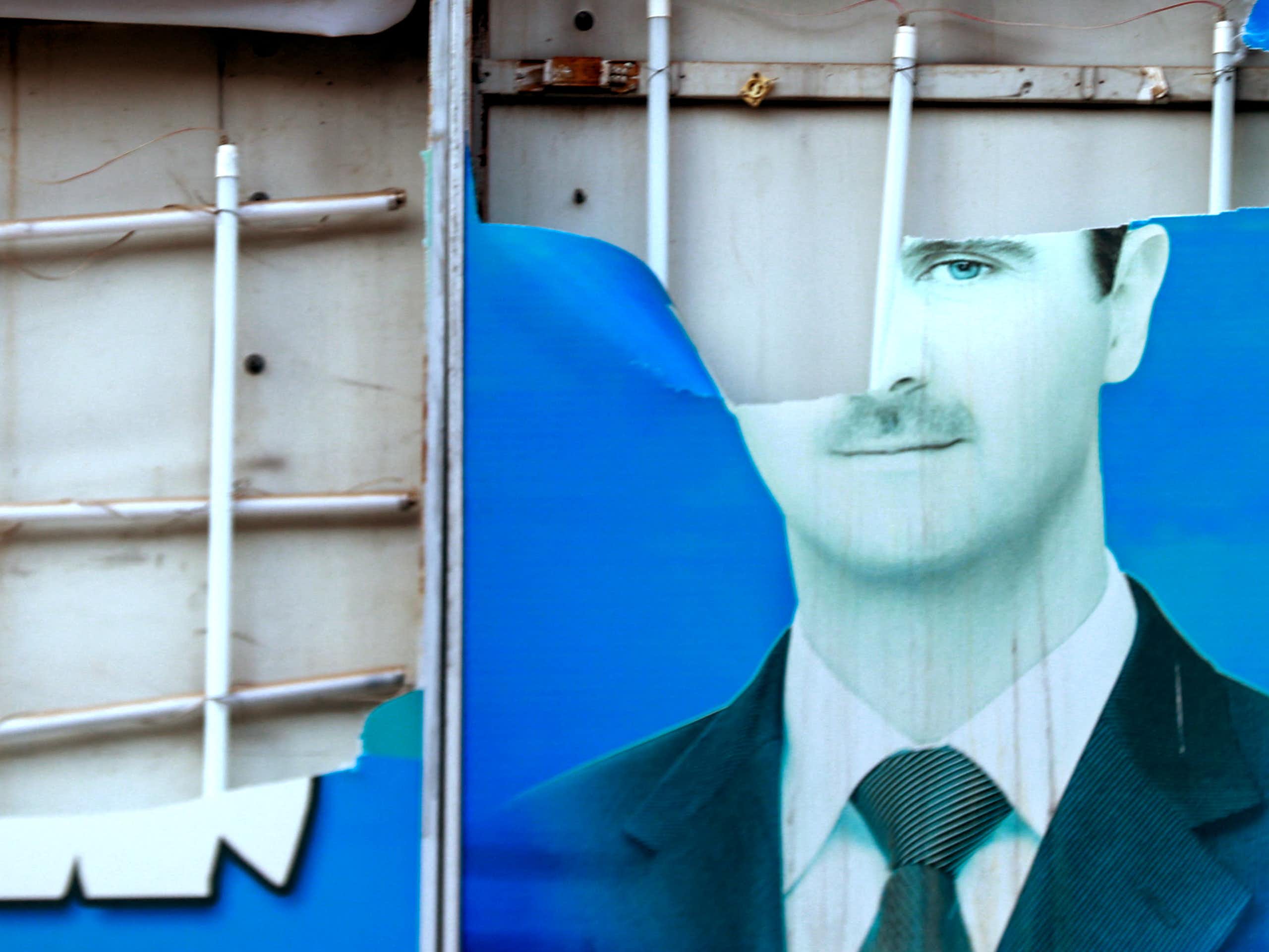 Atorn image of a man on a blue background.
