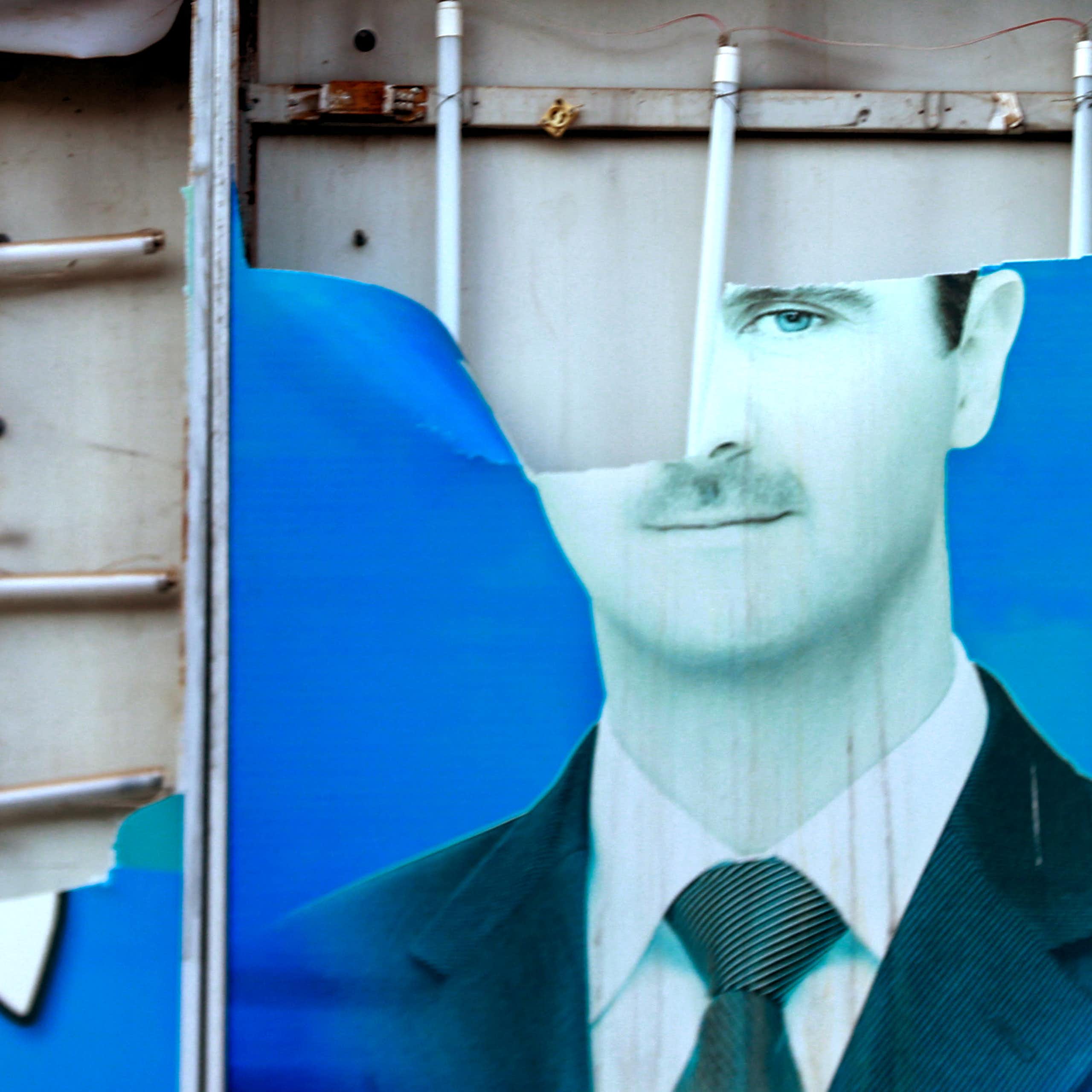 Atorn image of a man on a blue background.