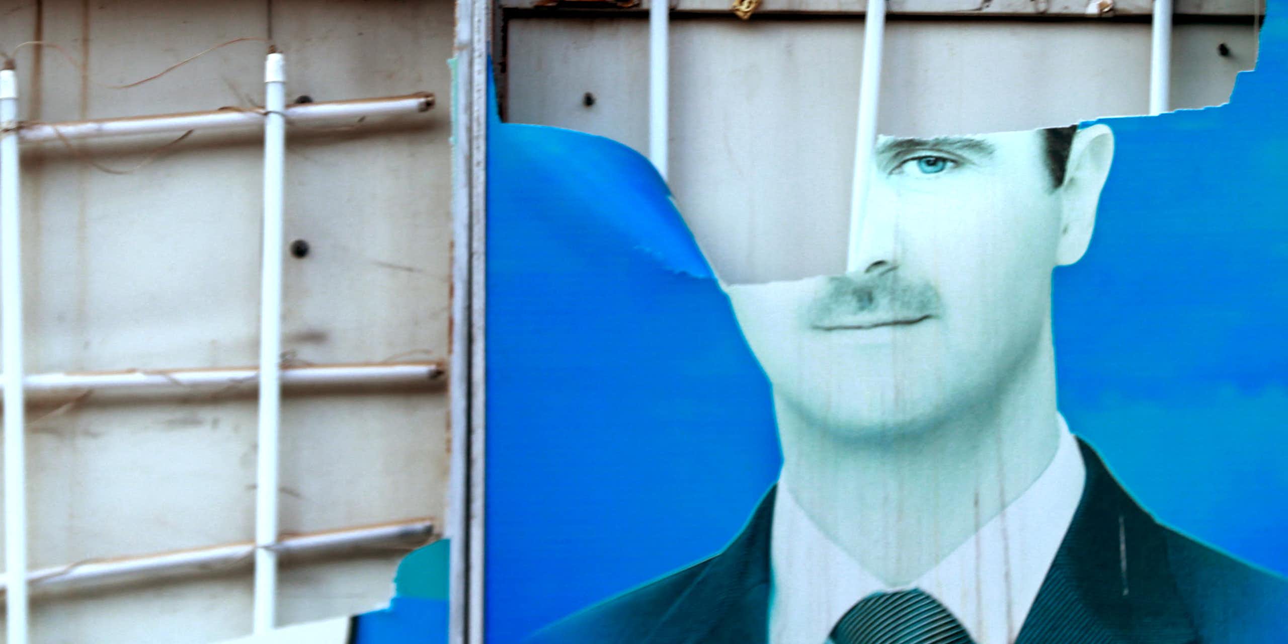 Atorn image of a man on a blue background.