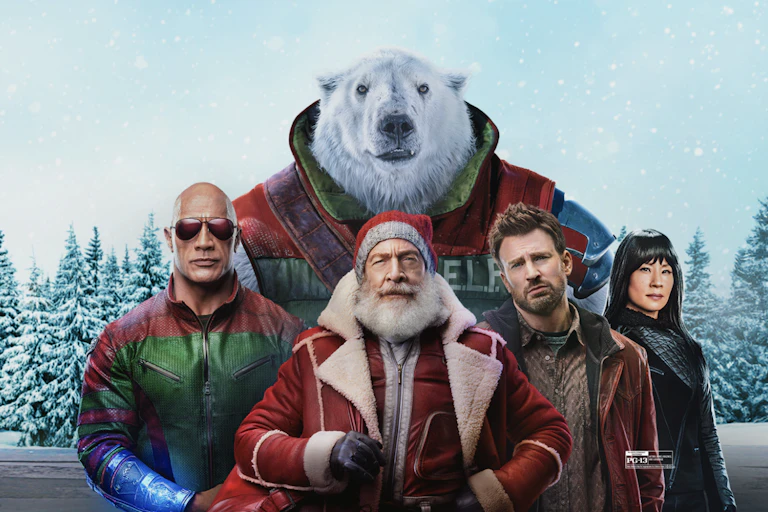 A film poster for Red One, with three kick-ass action heroes, a large polar bear and Santa Claus.