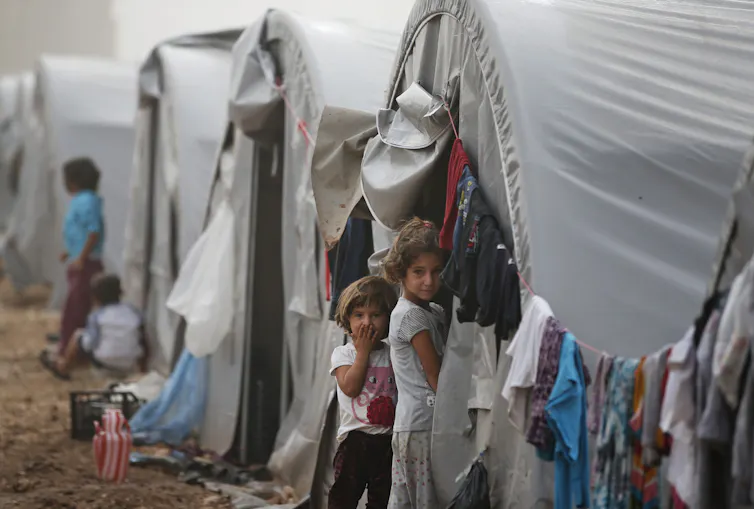 Syrian-Kurdish children at a refugee camp in 2014.