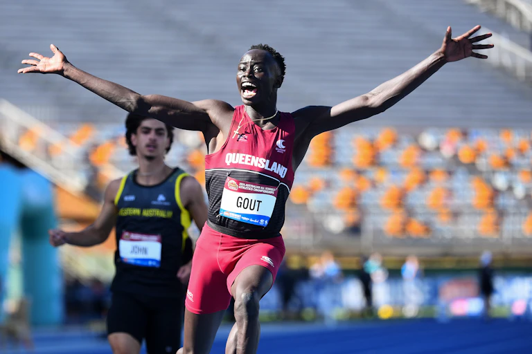 Gout Gout celebrates after winning a 100m race