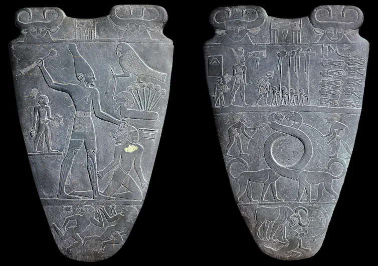 Two stone tablets with hieroglyphs.