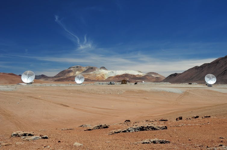 Three Alma antennas on the 5000-metre altitude plateau of Chajnantor in Chile.