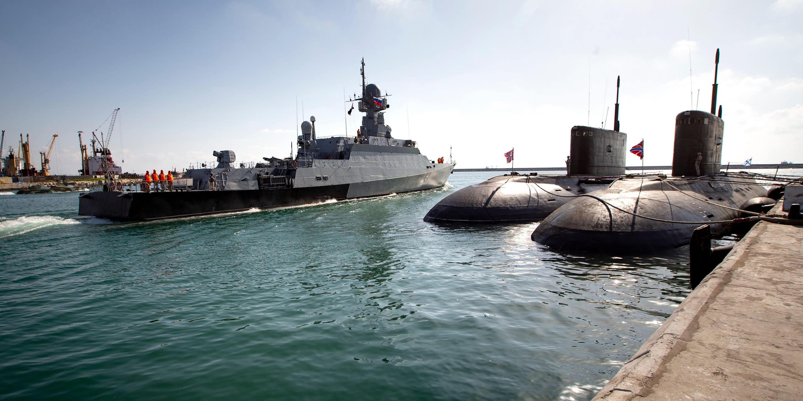 Two Russian mini-subs sit at anchor as a Russian missile ship sails out of Tartus naval base in Syria, September 2019.