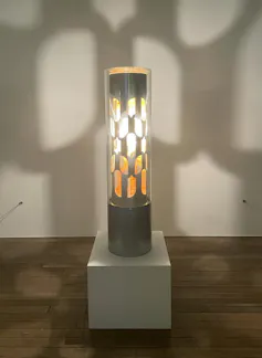 silver plinth casting light