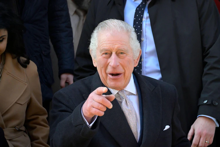 King Charles pointing at the camera.