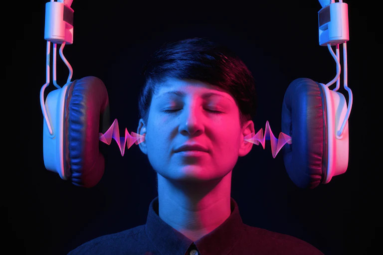 Sound wave transmission from headphone speakers to the human ear.